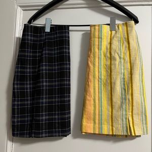 Two mini style skirts fit size 0-2